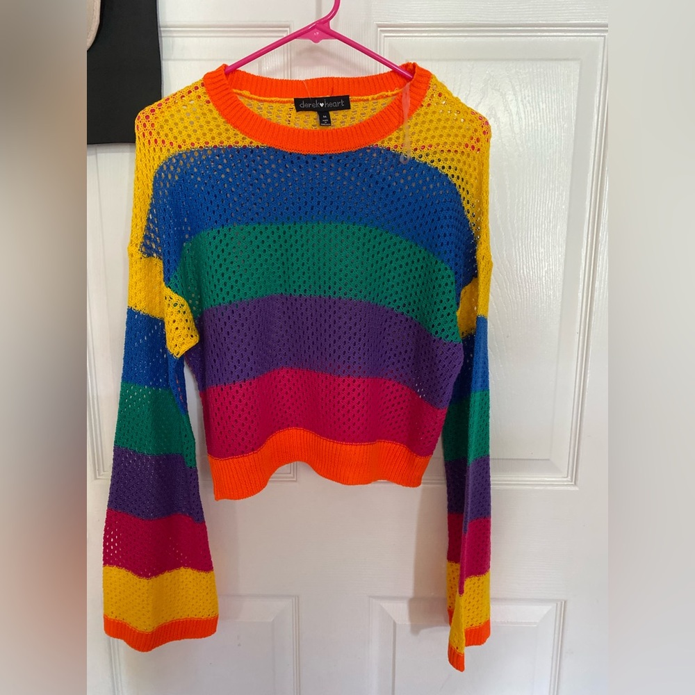 shirt with holes all around it and Bill sleeves brand new and tag still intact